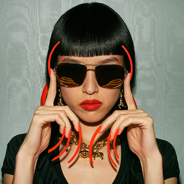 LE's Neon Orange Gel Paint Makes a Statement for the Vivienne Westwood x 10 Magazine Photoshoot